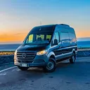 Mercedes Sprinter van on the Kona coast at sunset